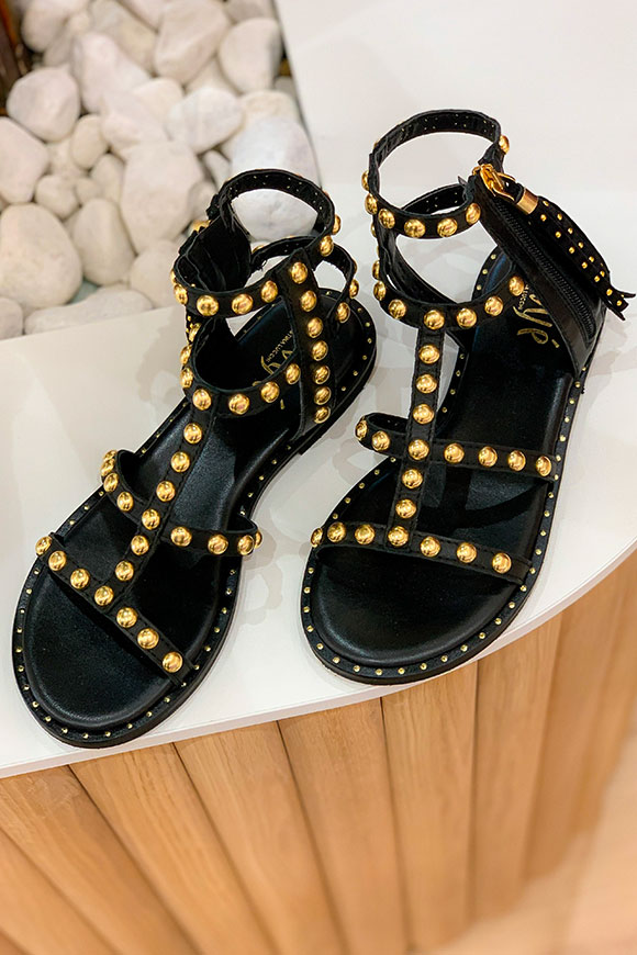 Ovyé - Black gladiator sandal with gold studs