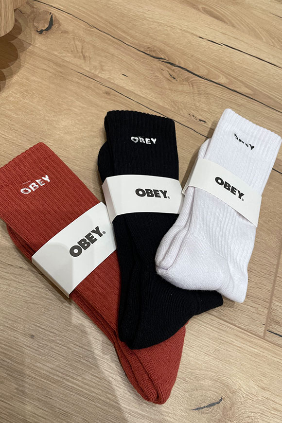 Obey - Rust socks with white embroidered logo in contrast