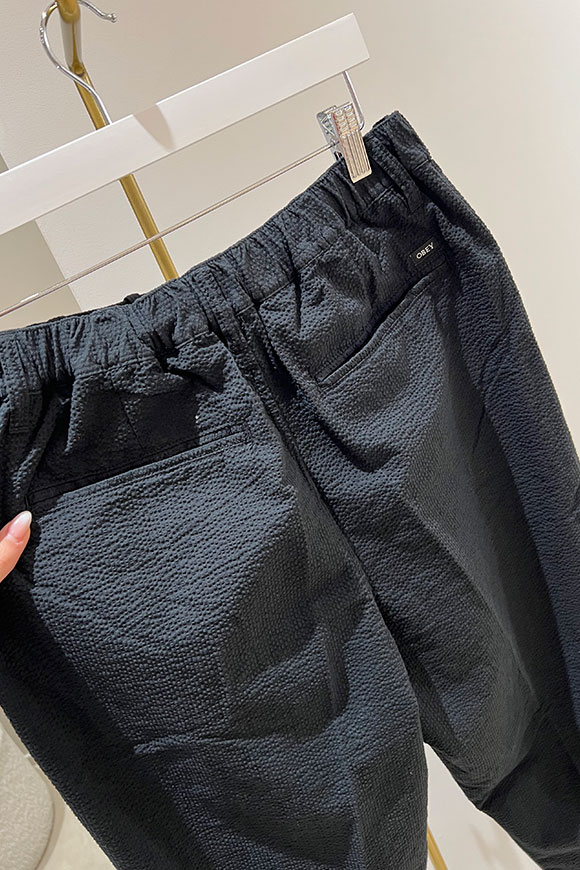 Obey - Pantalone nero tessuto goffrato dritto in cotone