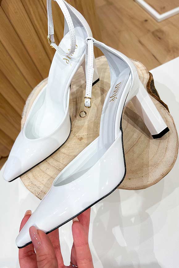 Ovyé - White patent leather pumps with pointed toe and rubber heel