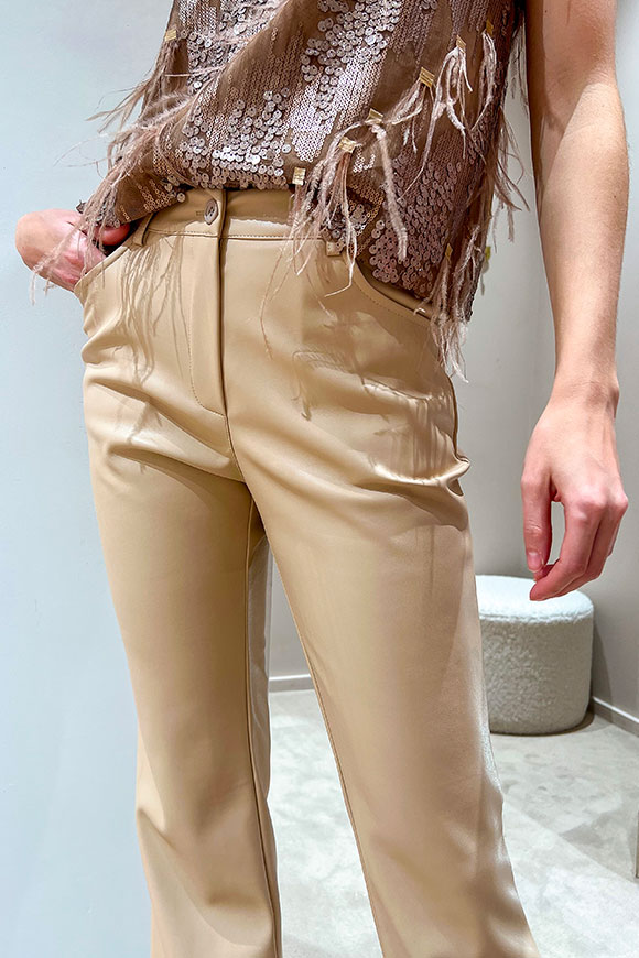 Tensione In - Beige flared trousers in eco-leather