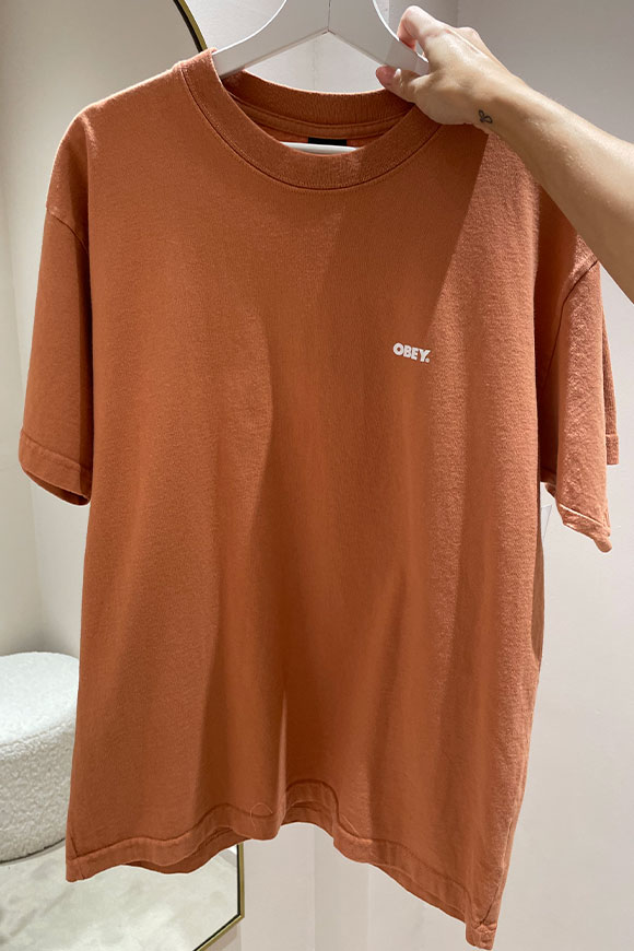 Obey - Peach-colored T-shirt with logo on the back