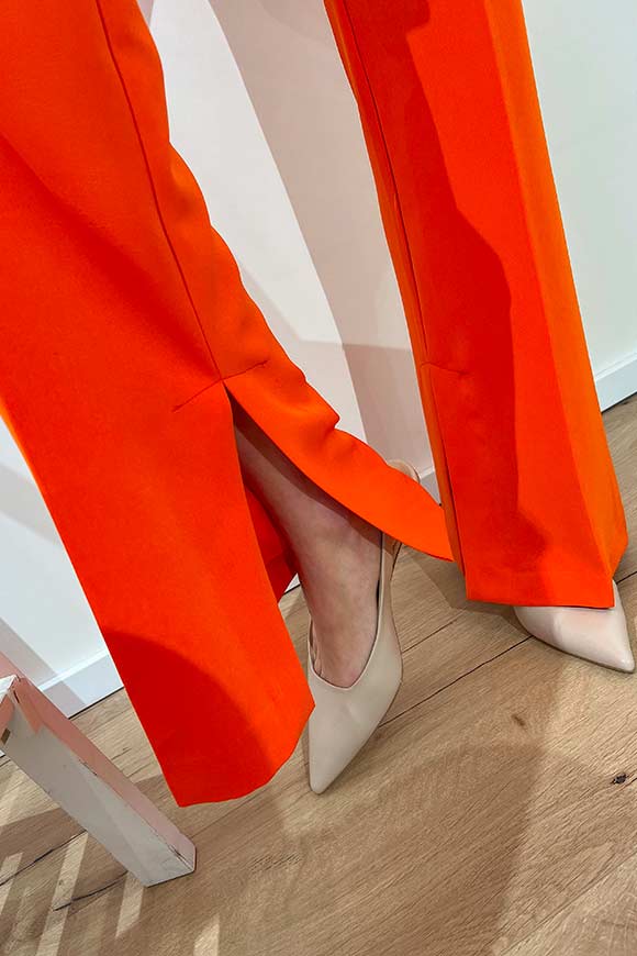 Kontatto - Pantaloni flare arancio con spacchetti sul fondo