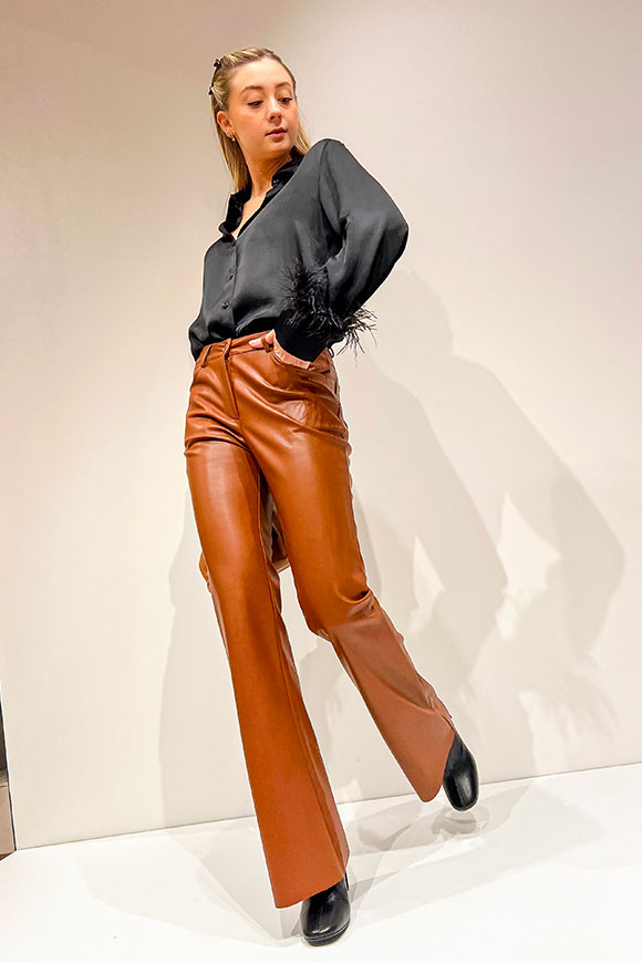 Tensione In - Flared leather trousers in faux leather