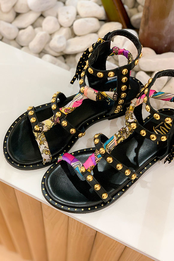 Ovyé - Black gladiator sandal with gold studs and multicolor foulard