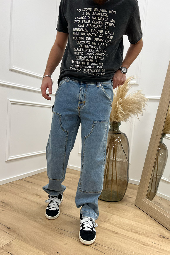 Berna - Jeans chiaro con tagli e impunture cammello