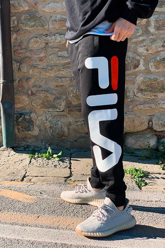 Fila - Pantaloni tuta con logo grande sulla gamba