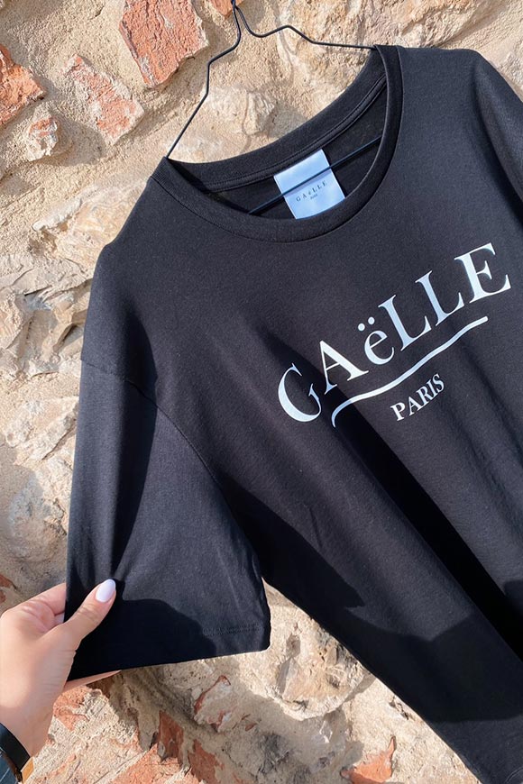 Gaelle - Black t shirt with white crossed out logo