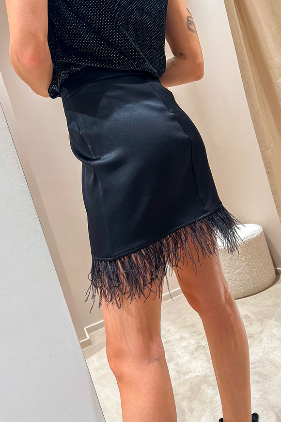 Tensione In - Black skirt with feathers on the bottom